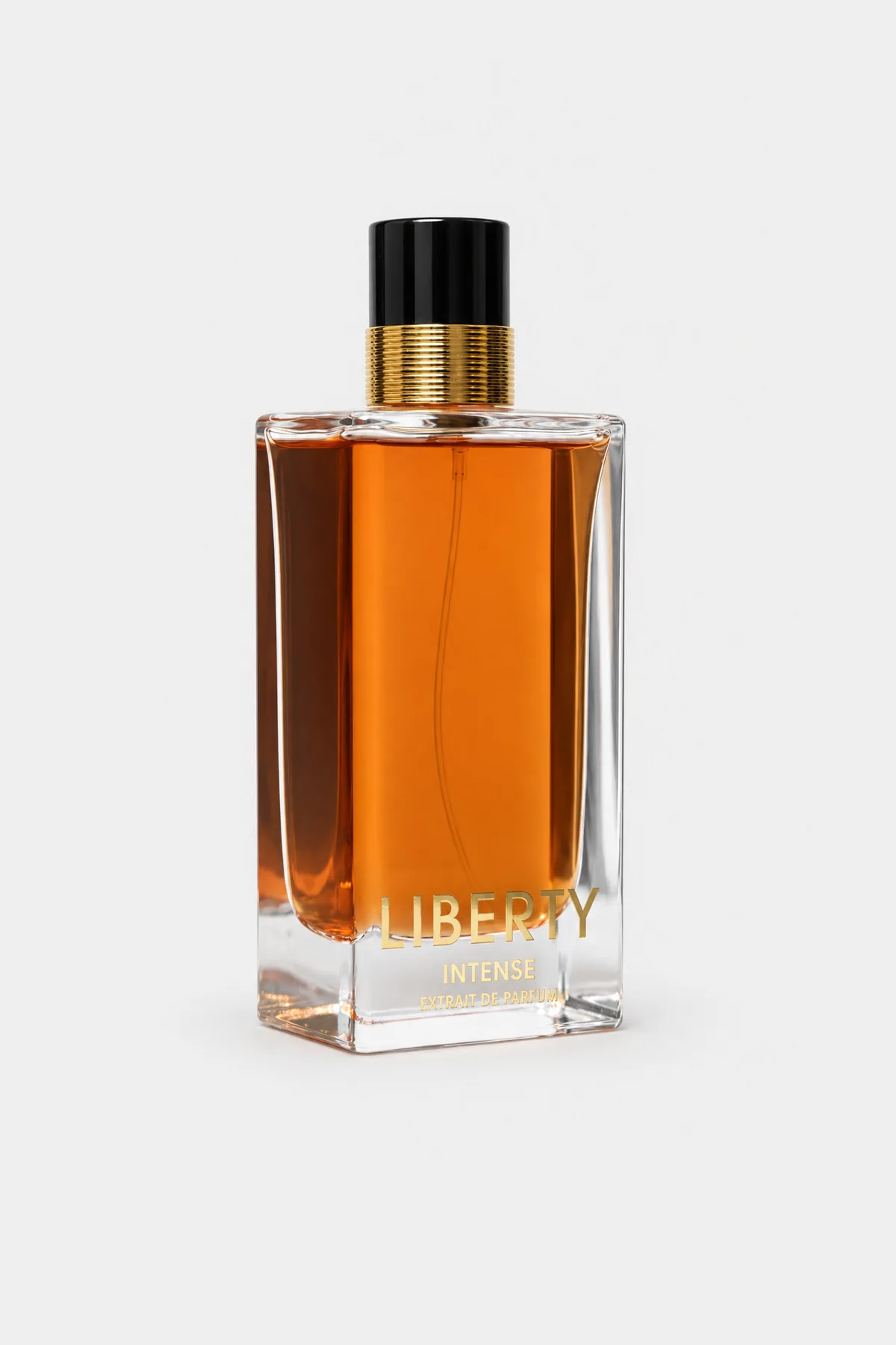 Fragrance World Liberty Intense Extrait de Parfum 100 ml, tall clear bottle with amber liquid, three-quarter view