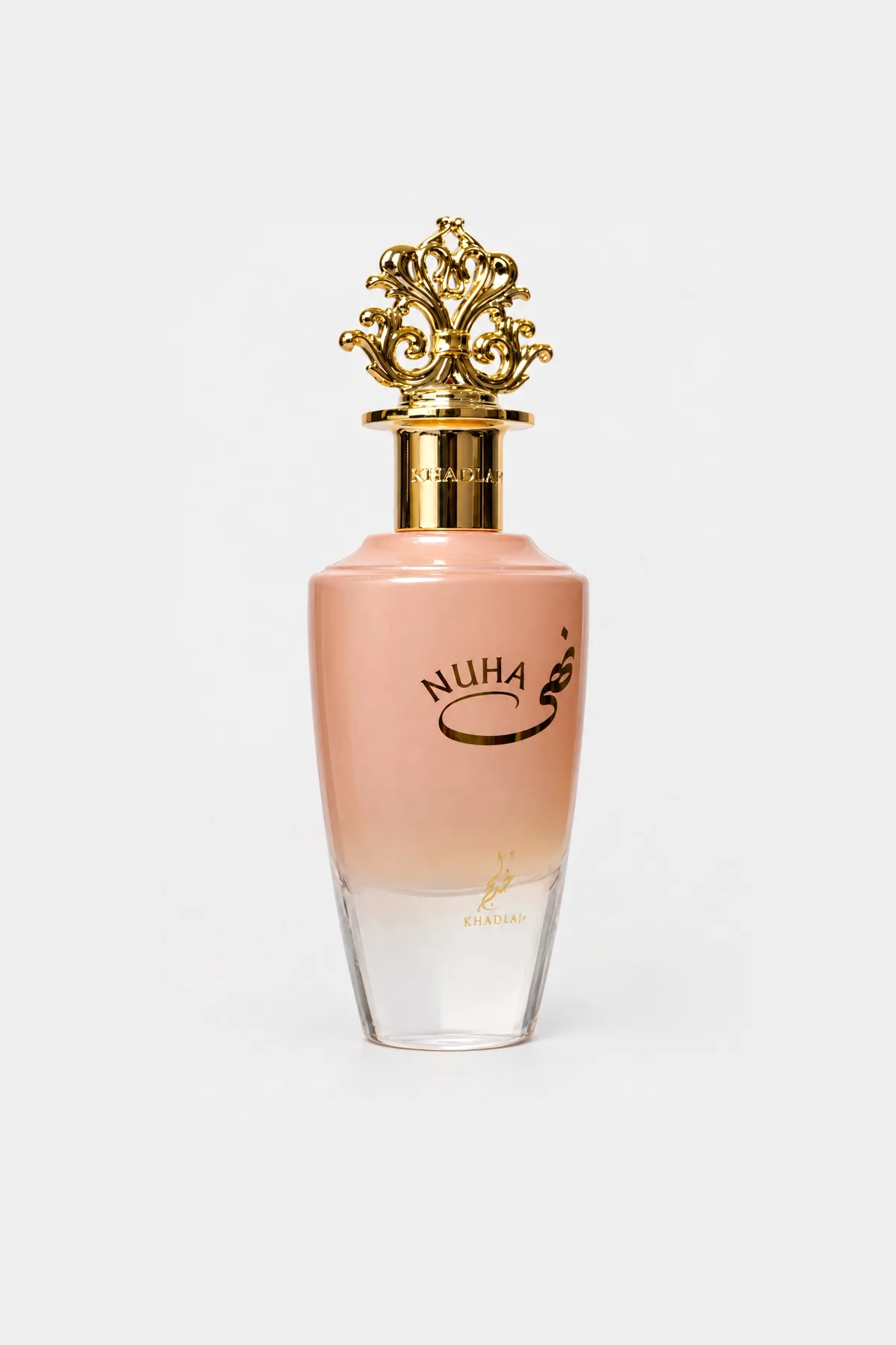 Khadlaj Nuha Eau de Parfum 85 ml, peach-to-clear bottle with a gold crown cap, three-quarter view