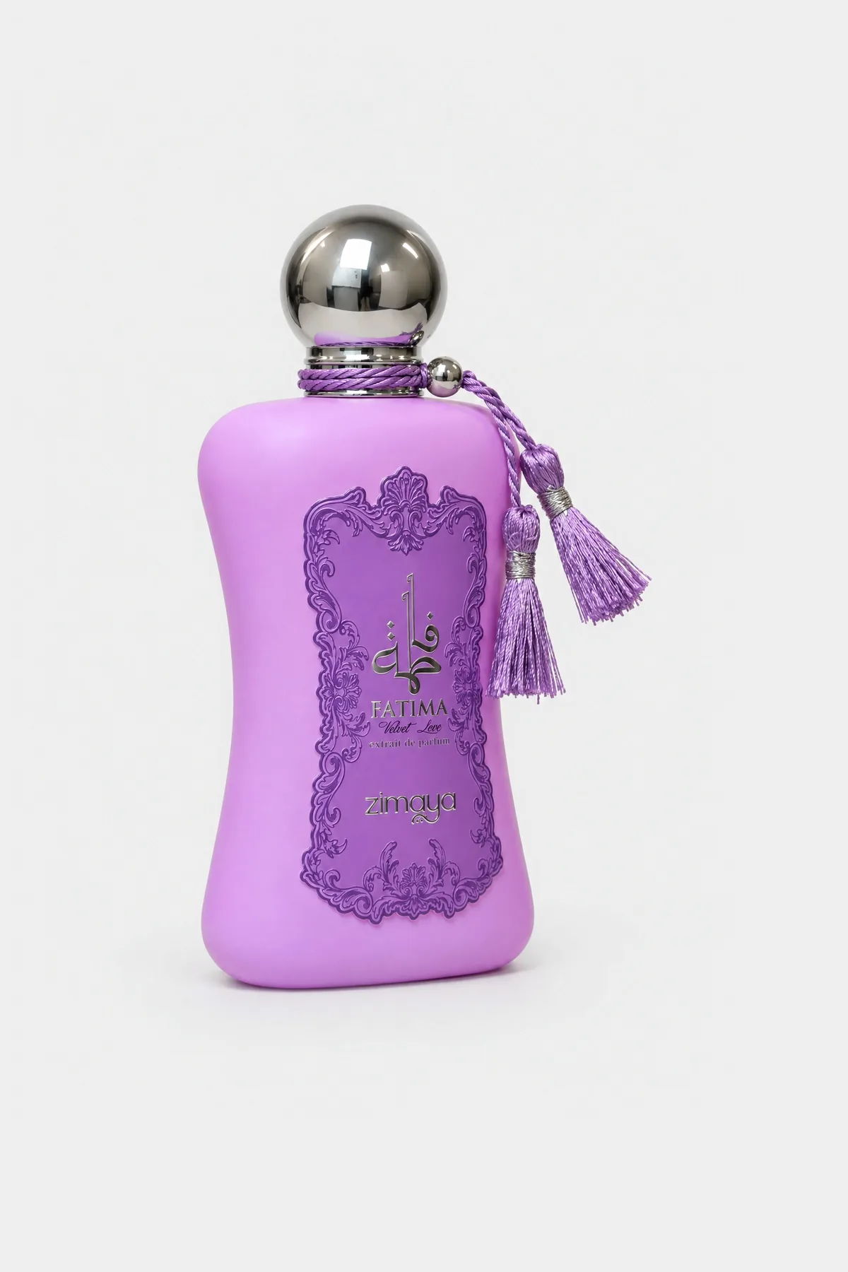 Zimaya Fatima Velvet Love Extrait de Parfum 100 ml, lilac bottle with a tassel and silver cap, three-quarter view