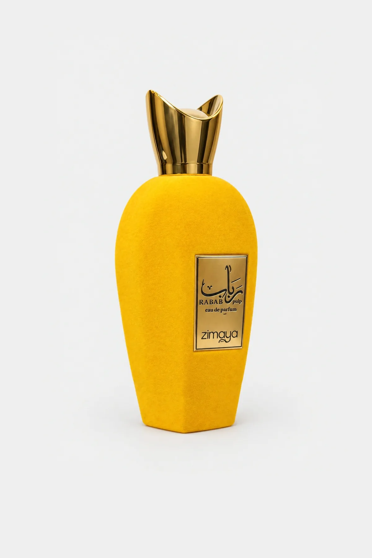 Zimaya Rabab Pulp Eau de Parfum 100 ml, yellow velvet bottle with a gold cap, three-quarter view